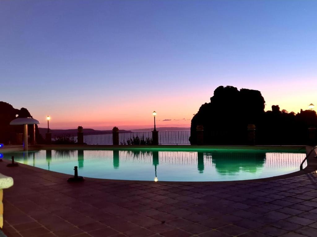 L'Estasi Tanca Piras A Bordo Piscina Con Vista Mare Villa Nebida ภายนอก รูปภาพ