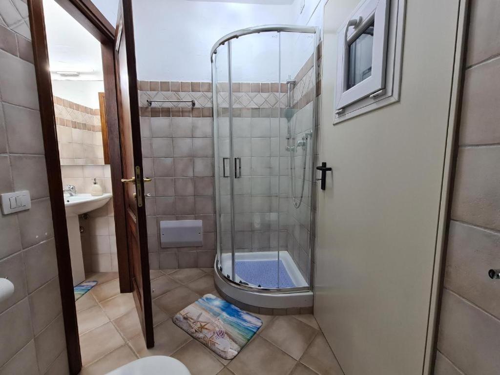 L'Estasi Tanca Piras A Bordo Piscina Con Vista Mare Villa Nebida ภายนอก รูปภาพ
