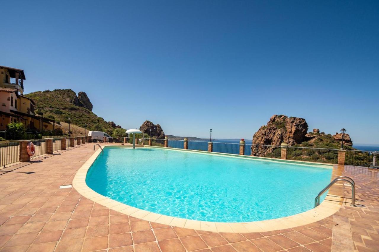 L'Estasi Tanca Piras A Bordo Piscina Con Vista Mare Villa Nebida ภายนอก รูปภาพ