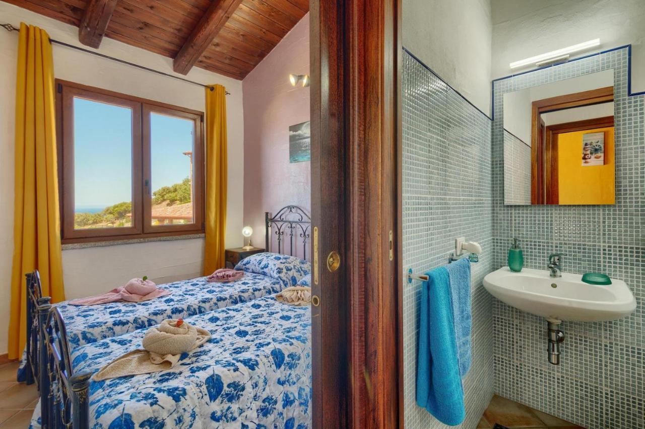 L'Estasi Tanca Piras A Bordo Piscina Con Vista Mare Villa Nebida ภายนอก รูปภาพ