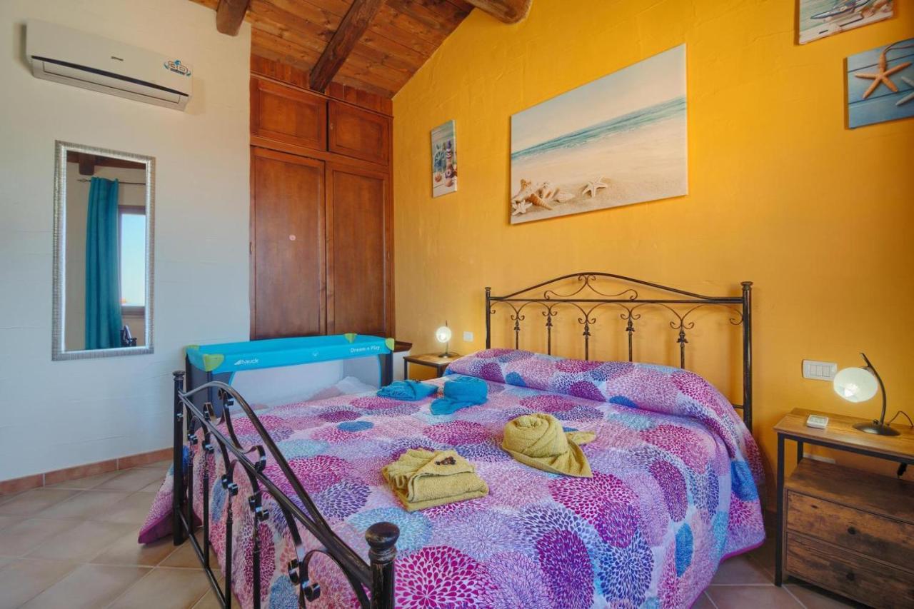 L'Estasi Tanca Piras A Bordo Piscina Con Vista Mare Villa Nebida ภายนอก รูปภาพ