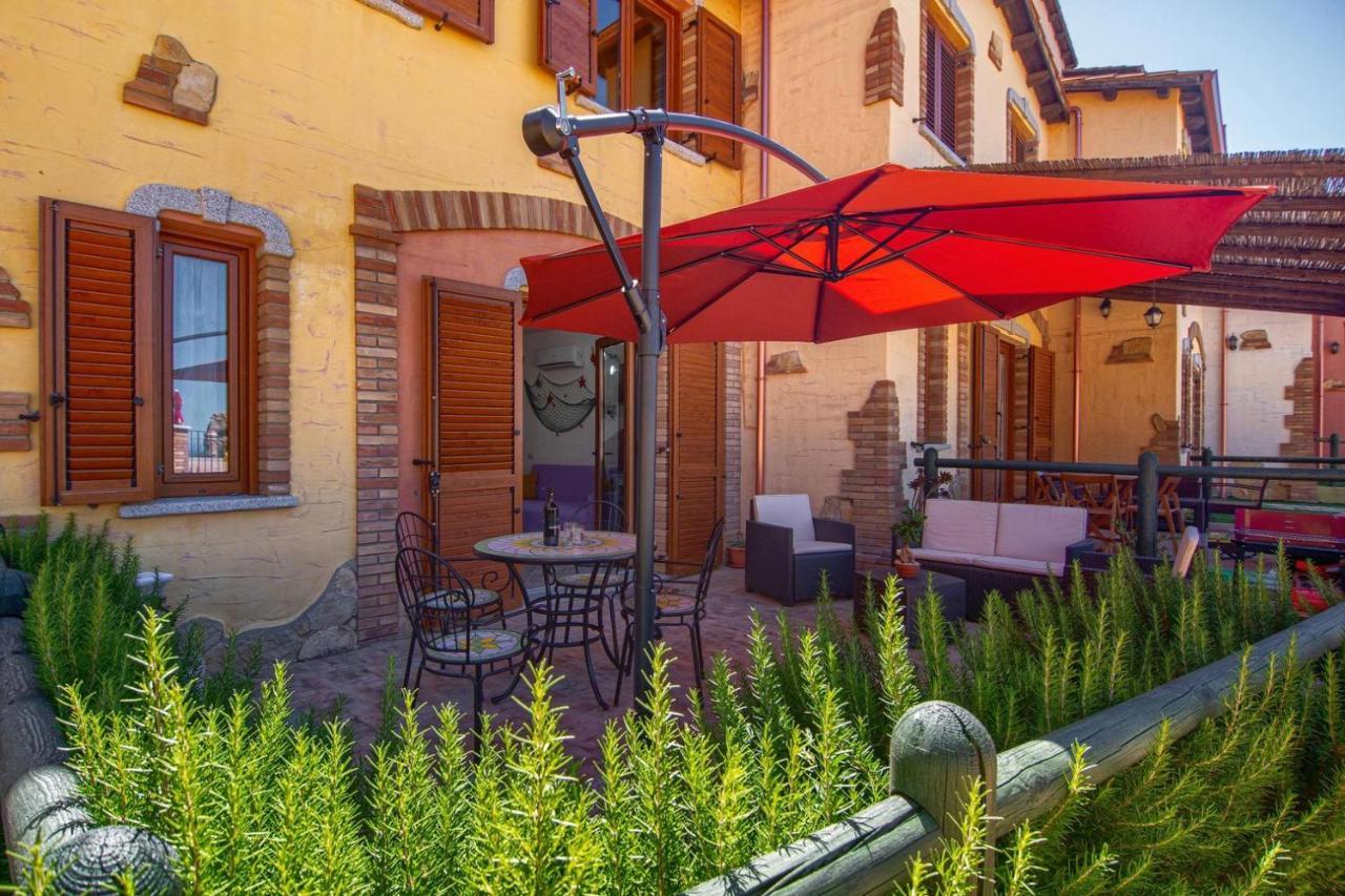 L'Estasi Tanca Piras A Bordo Piscina Con Vista Mare Villa Nebida ภายนอก รูปภาพ