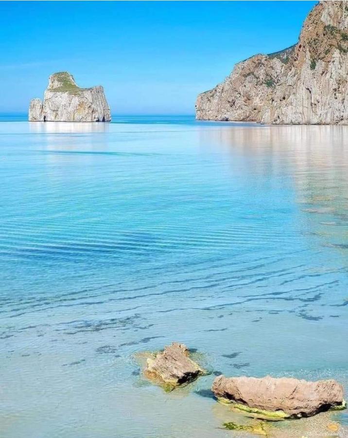 L'Estasi Tanca Piras A Bordo Piscina Con Vista Mare Villa Nebida ภายนอก รูปภาพ